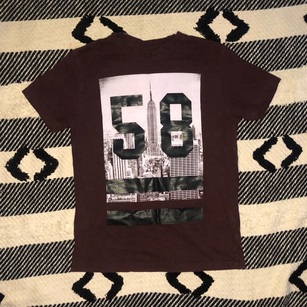 Burgundy Aeropostale shirt.